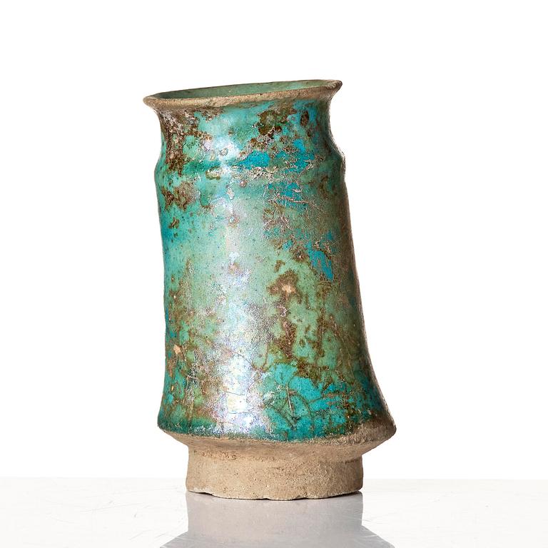 A Kashan Turquoise glazed pottery vase, central Persia (Iran), 11th to 12th century.