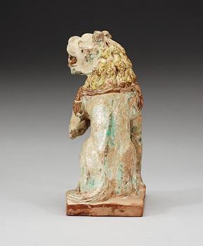 A green and yellow glazed lion with a cub, Song dynasty (960-1279).