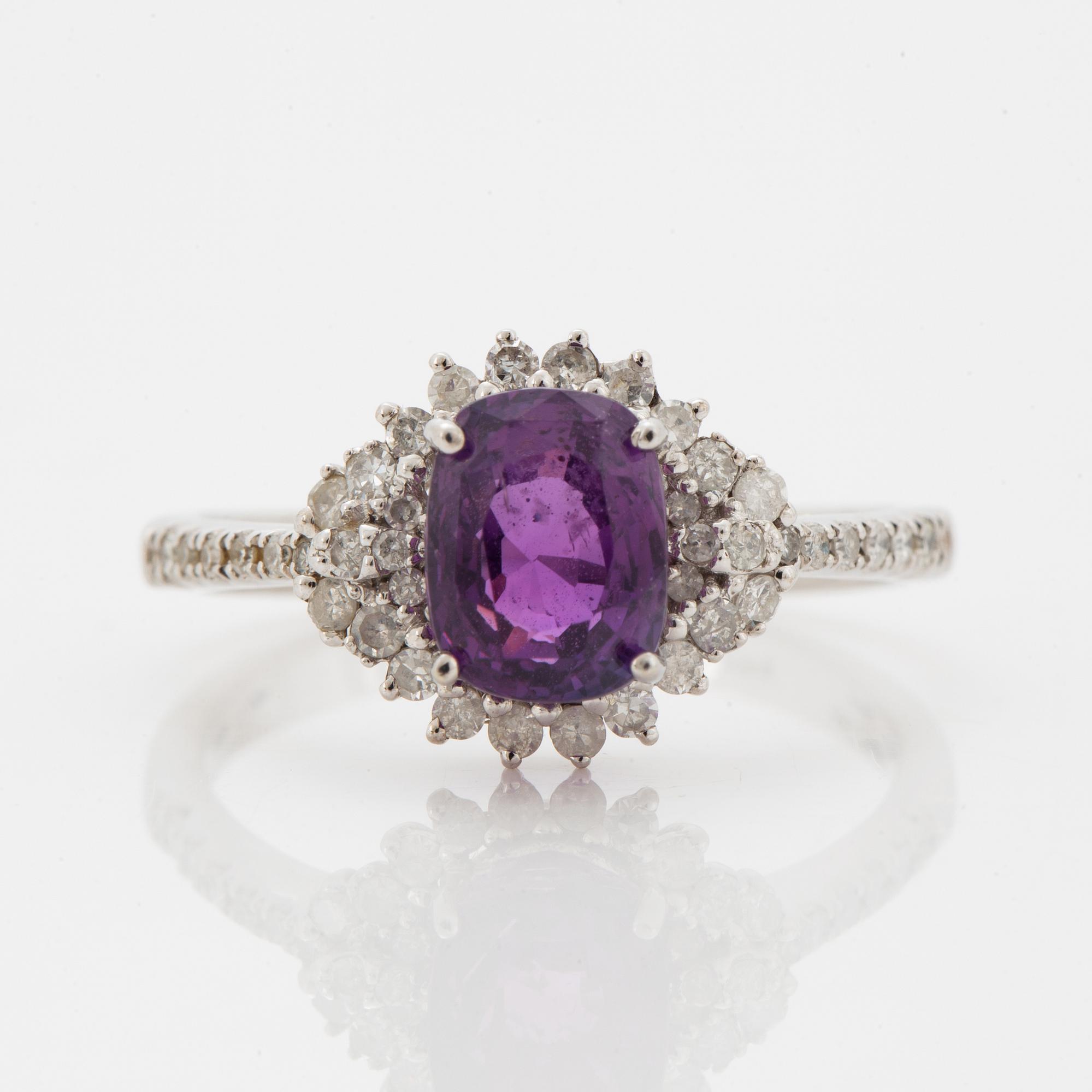Pink purple sapphire and eight-cut diamond ring.