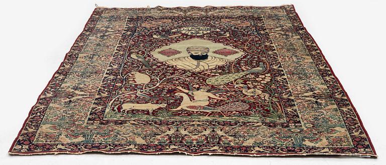 An antique Kirman Laver figural, Southeastern Iran, c. 220 x 135 cm.