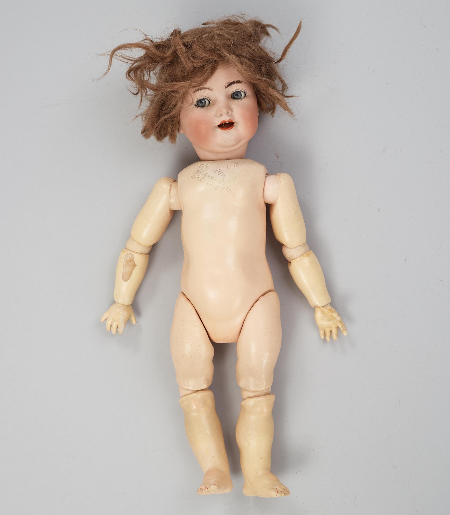 a Simon Halbig 126 porcelain doll Germany ca 1914. Bukowskis