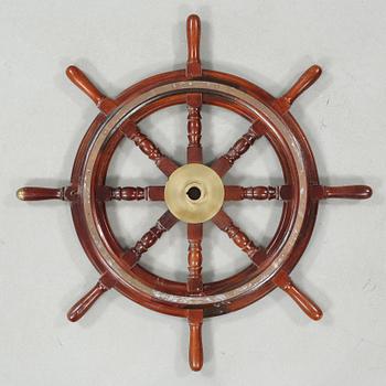 A ship wheel from John Hastie & Co, Greenrock, 20th century.