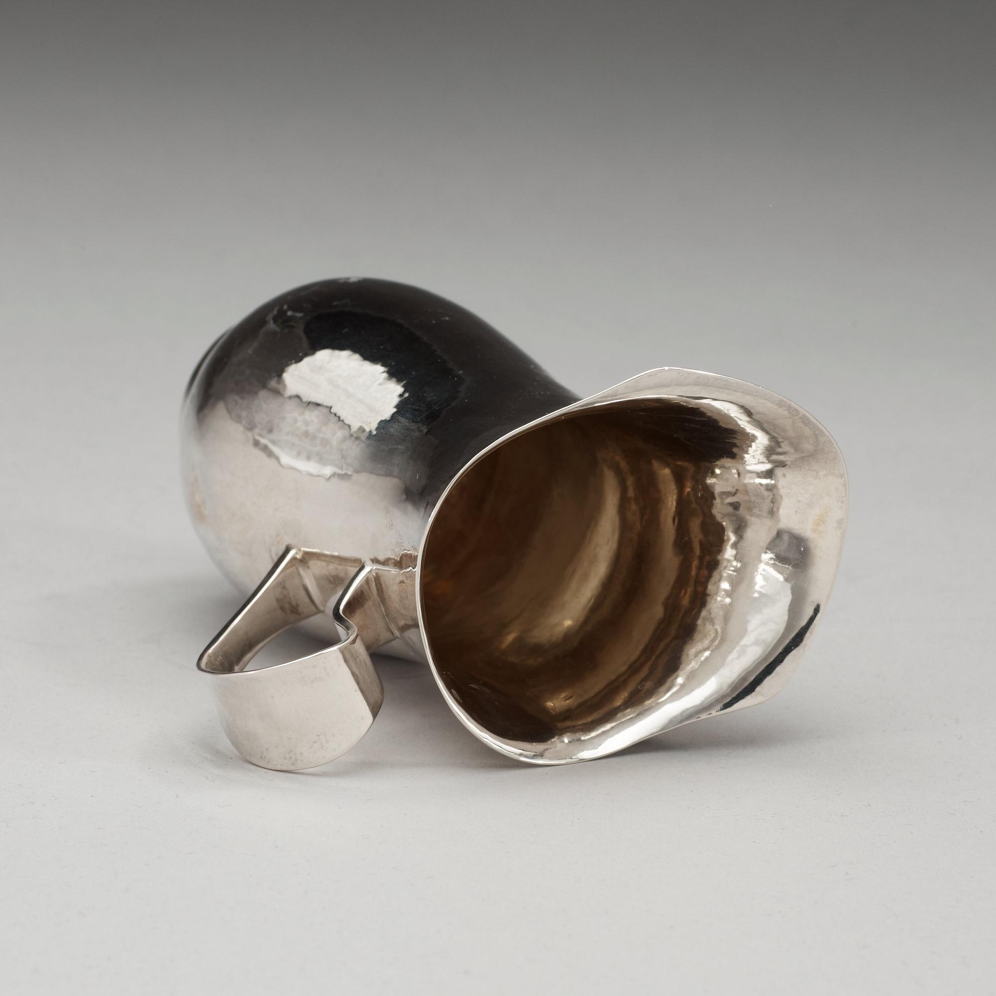 A Sigurd Persson silver jug, Stockholm 1949.