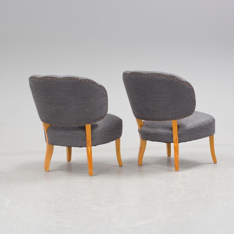 A pair of "Gamla Berlin" easy chairs by Carl Malmsten.