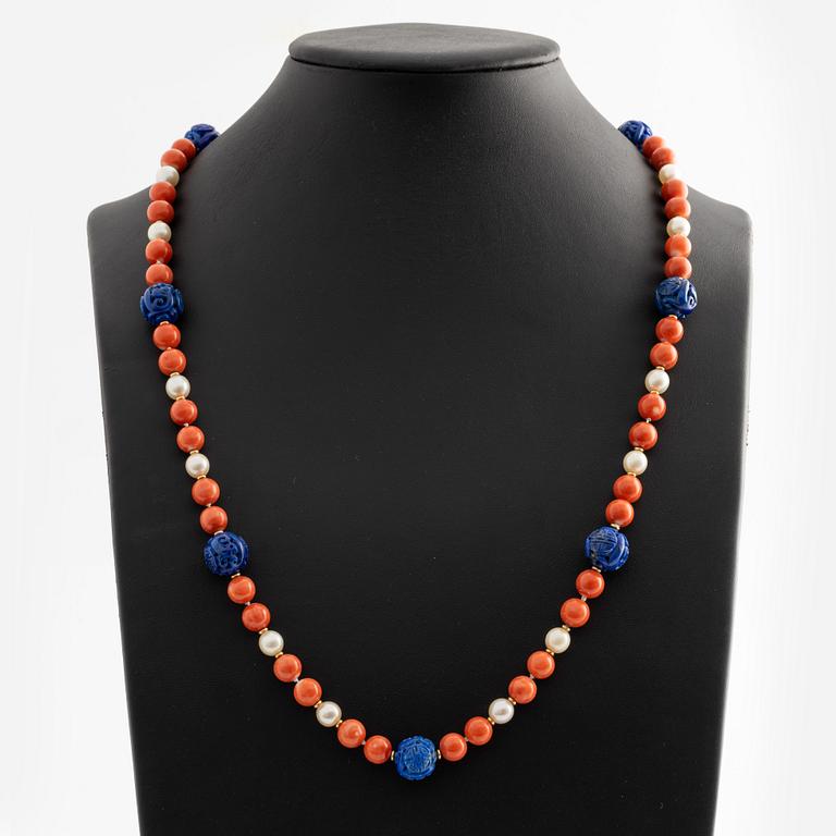Necklace with coral, cultured pearls, and likely lapis lazuli.