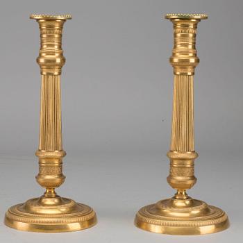 LJUSSTAKAR, ett par, brons, empire, 1800-talets första hälft.