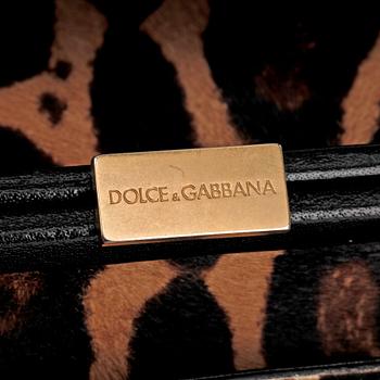 DOLCE & GABBANA, a leopard patterned handbag.