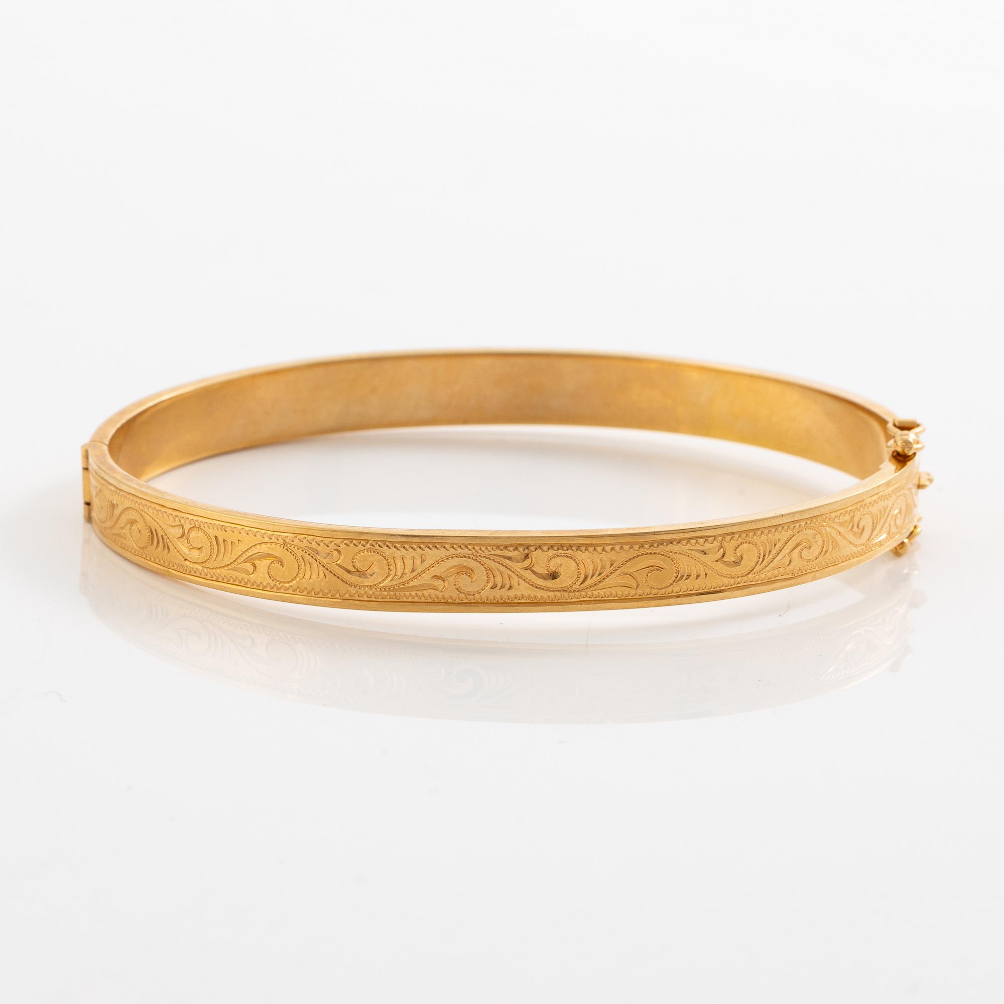 Arm ring, 18K gold.