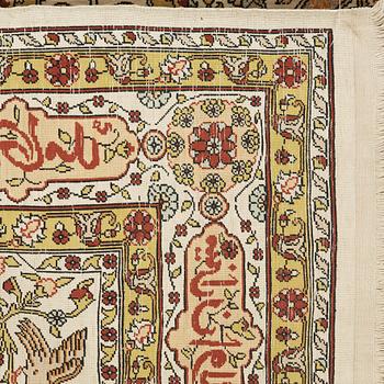 A silk Hereke possibly, around 96 x 66 cm.