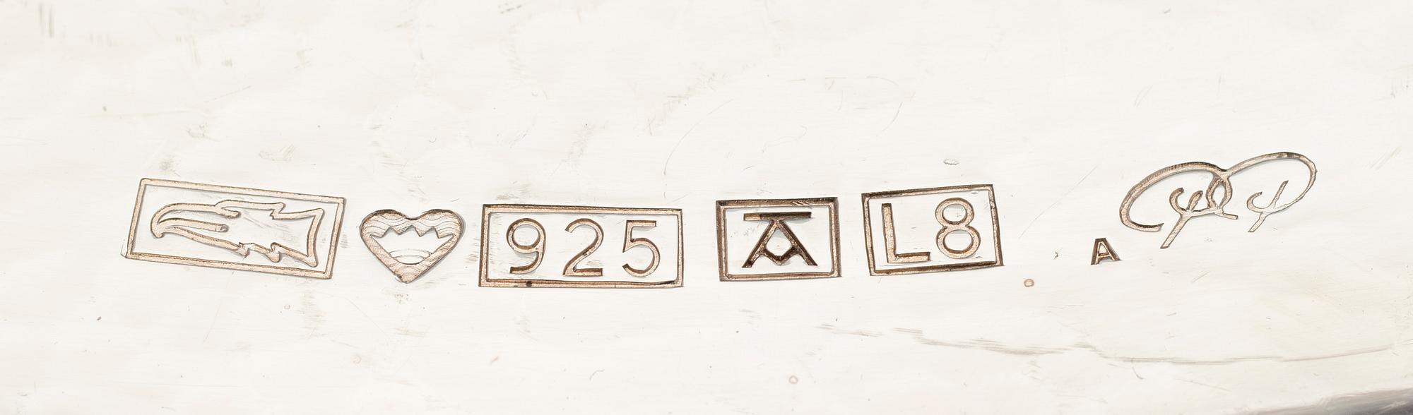 A silver tray marked Auran kultaseppä 1988, weight 1707 g.