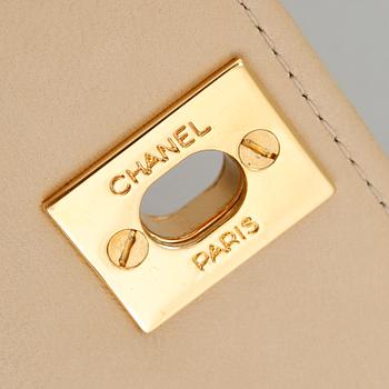 A Chanel lamb skin handbag.