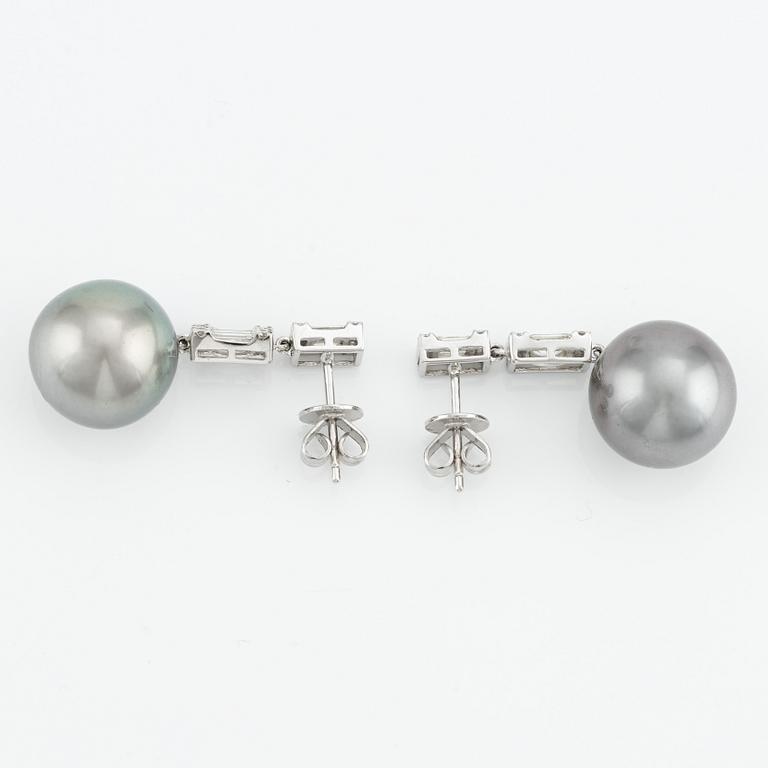 Earrings with cultured pearls and baguette and brilliant-cut diamonds.