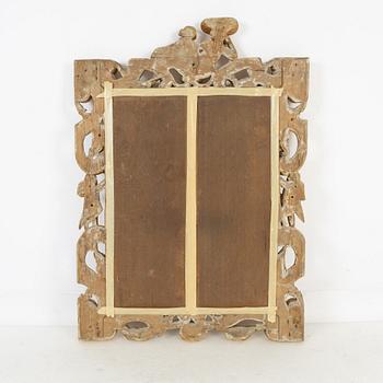 A gilt Baroque style mirror, circa 1900.