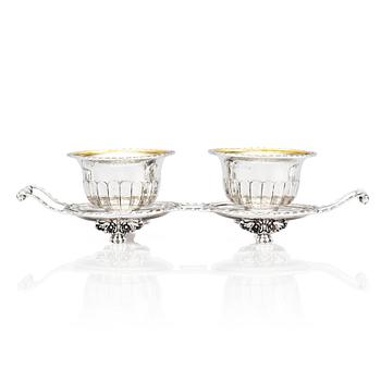 A pair of Swedish candy bowls with stand, parcel-gilt silver, mark of Gustaf Möllenborg, Stockholm 1851.