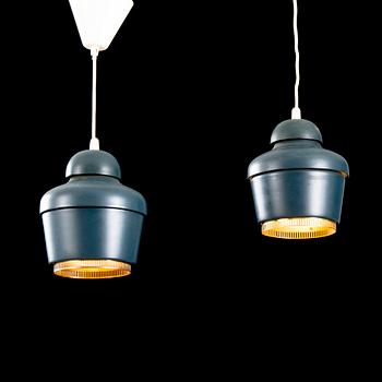 A pair of 'A330' ceiling lamps for Valaistustyö.