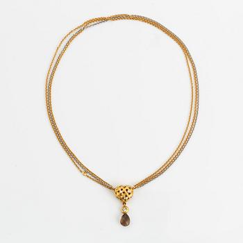Ole Lynggaard, Charlotte Lynggaard, lås flätat hjärta med diamanter, collier, nyckelberlock med rökkvarts och akvamarin.