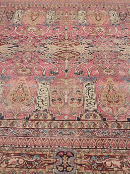 A CARPET, an antique Kerman Laver, ca 363 x 301 cm.