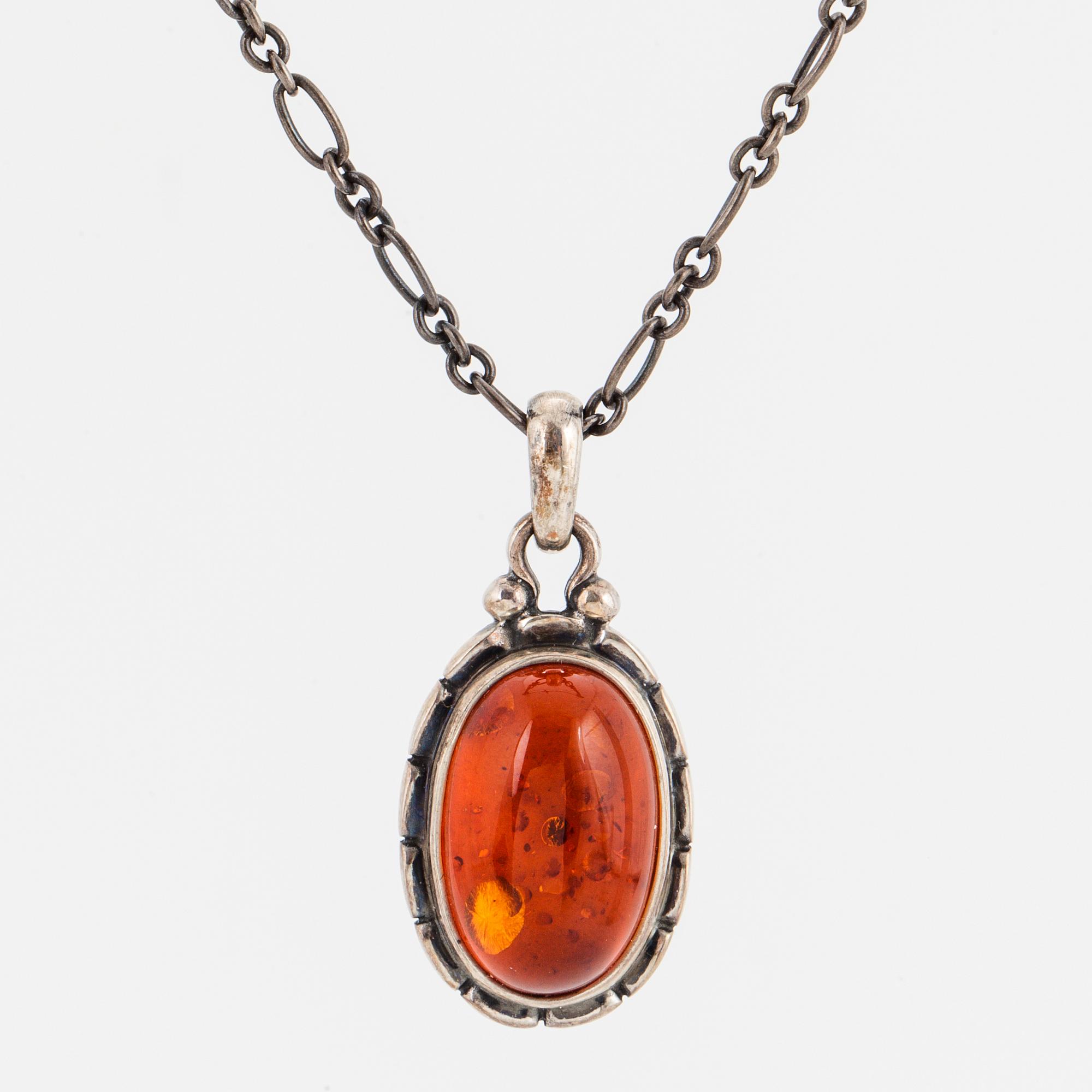 GEORG JENSEN, Pendant of the year 2001, with amber.