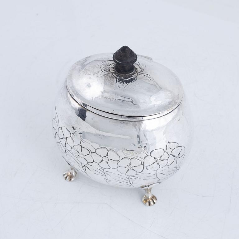 A silver sugar box, early 20th Century.