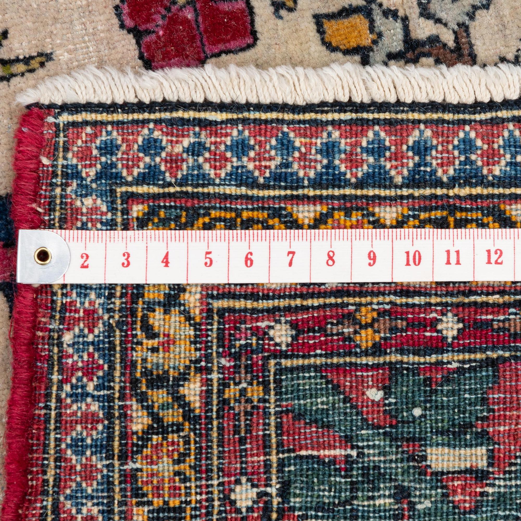 An antique pictoral Esfahan rug, Central Persia (Iran), c 213 x 142 cm.