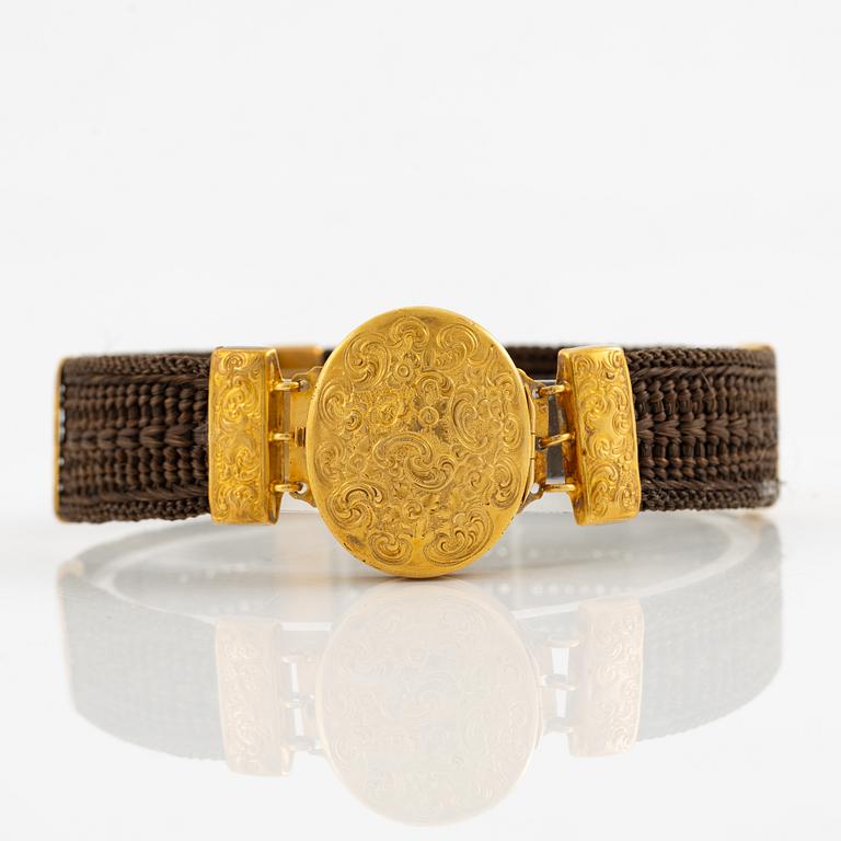Armband hårarbete och 14K guld.