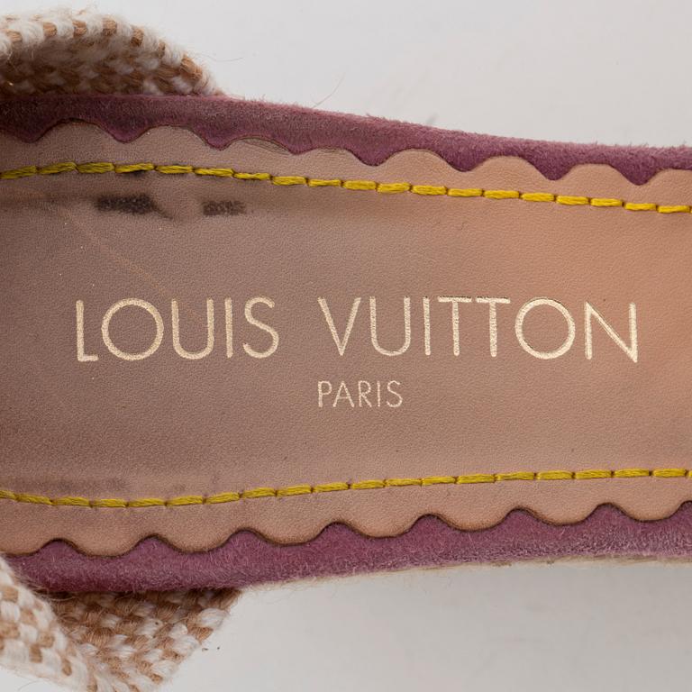 LOUIS VUITTON, a pair of straw and pink suede wedge sandals.