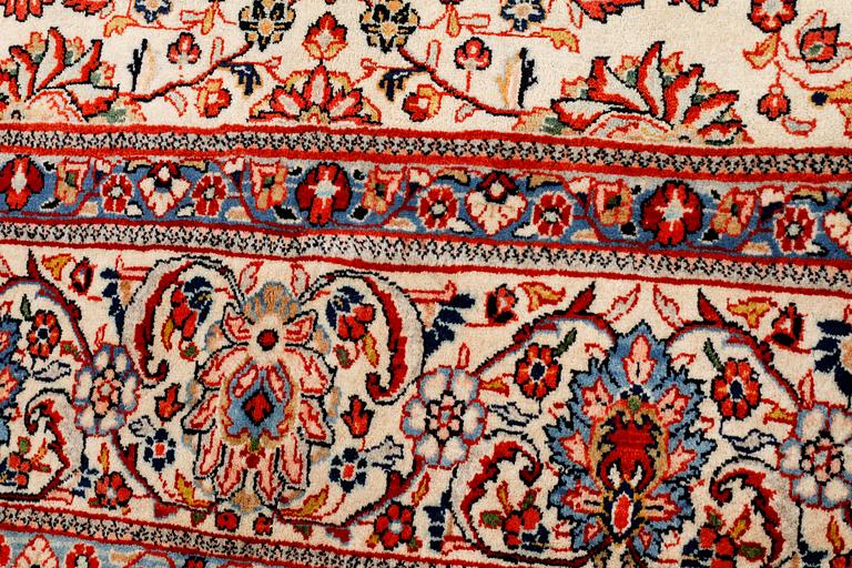 A Sarouk rug, 365 x 250 cm.