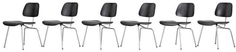 A set of six Charles & Ray Eames 'DCM' chairs by Vitra.