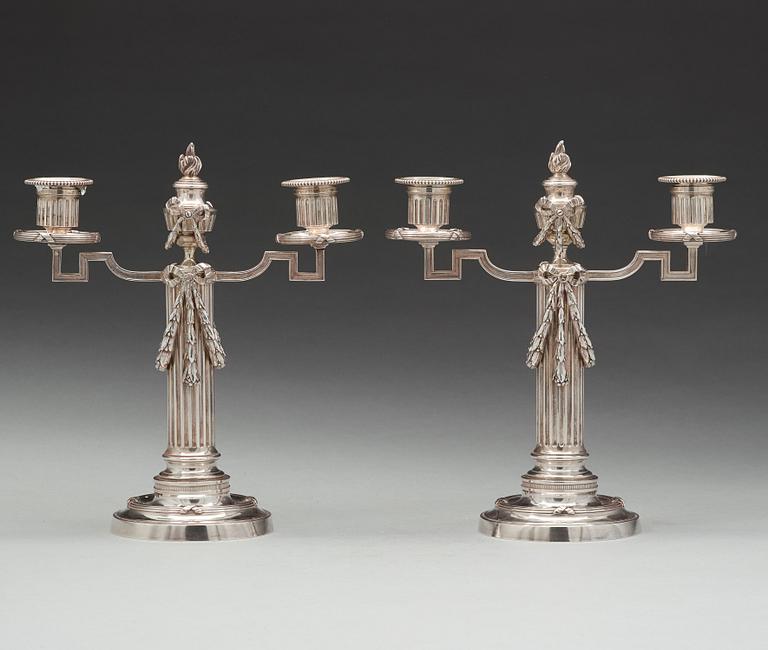 A pair of Fabergé, silver candelabra, workmaster Julius Rappoport, S.t Petersburg before 1899.