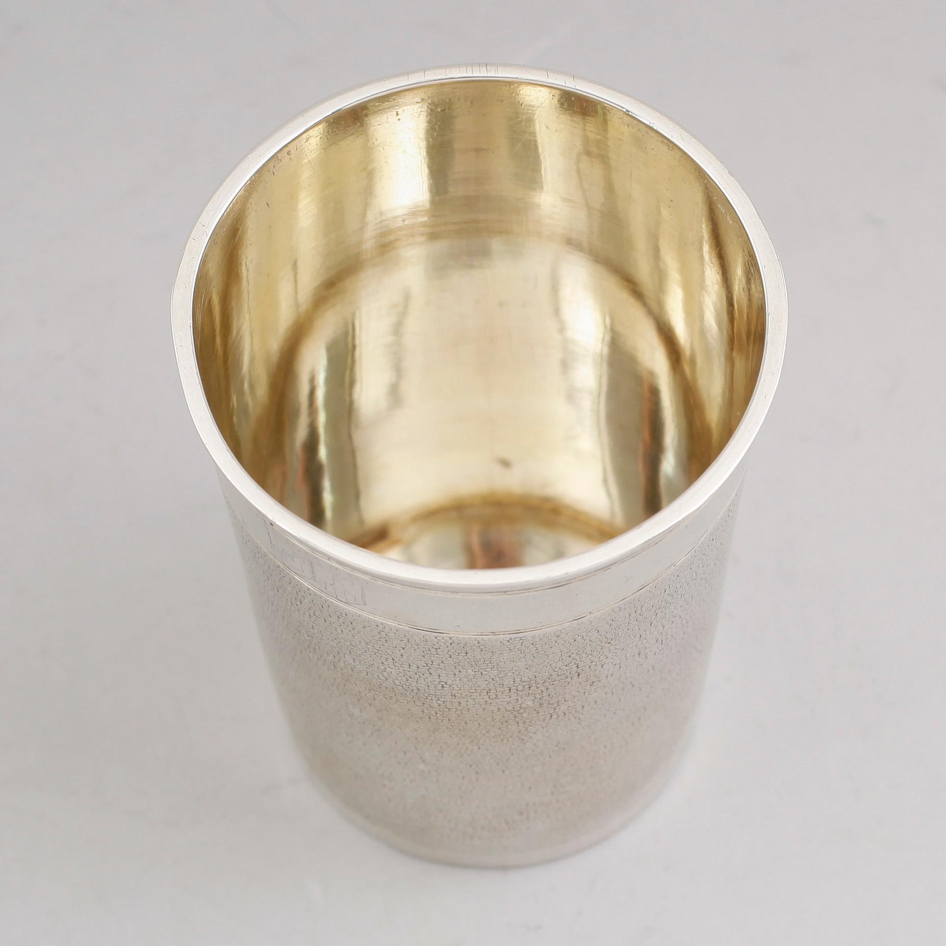 A German 17th century parcel-gilt beaker, marks of Johan Seutter, Augsburg 1670-1680.