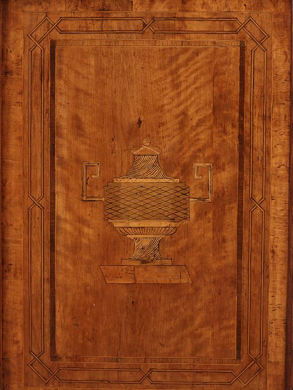 A matched pair of Gustavian ormolu-mounted limestone topped and marquetry commodes by C. Lindborg, late 18th century.