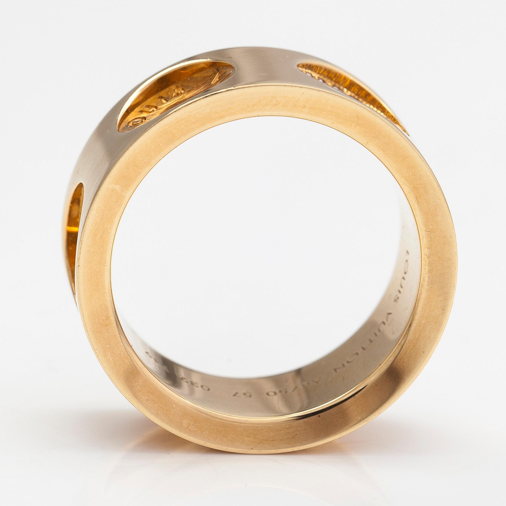 Louis Vuitton, an 18K gold 'Empreinte' ring with diamonds.