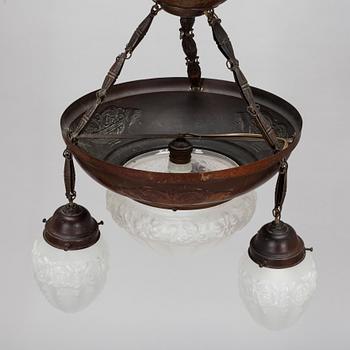 An Art Nouveau ceiling lamp, early 20th century.
