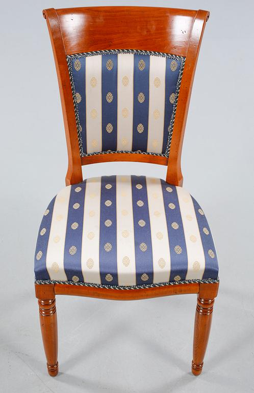 A dining set with seven pieces, designed Louis Philippe, Selva, from late 20th century.