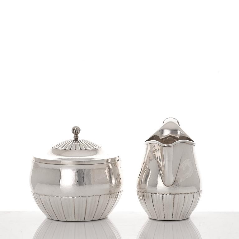 Johan Rohde, a three pieces sterling silver coffee service "Cosmos", Georg Jensen, Copenhagen 1945-77, design nr 45 A + D.