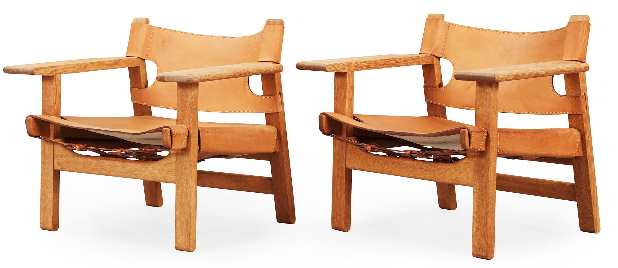 A pair of Børge Mogensen oak and leather 'Spanish chairs', Fredericia stolefabrik, Denmark.