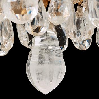 A late Baroque-style rock crystal twelve-light chandelier, circa 1900.