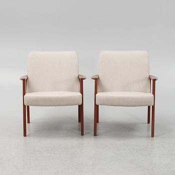 A pair of mid-century easy chairs.