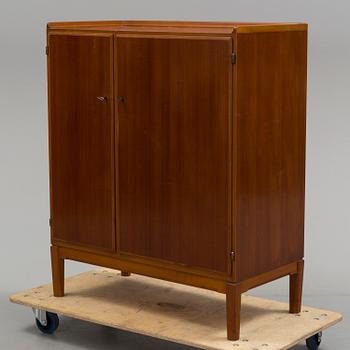 A cabinet by David Rosén for Nordiska Kompaniet dated 1954.