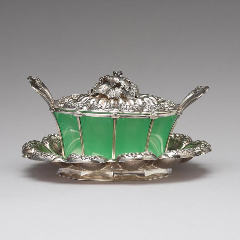 An Austrian mid 19th century silver and green glass bowl and cover on dish, un identified makers mark, Vienna 1845.