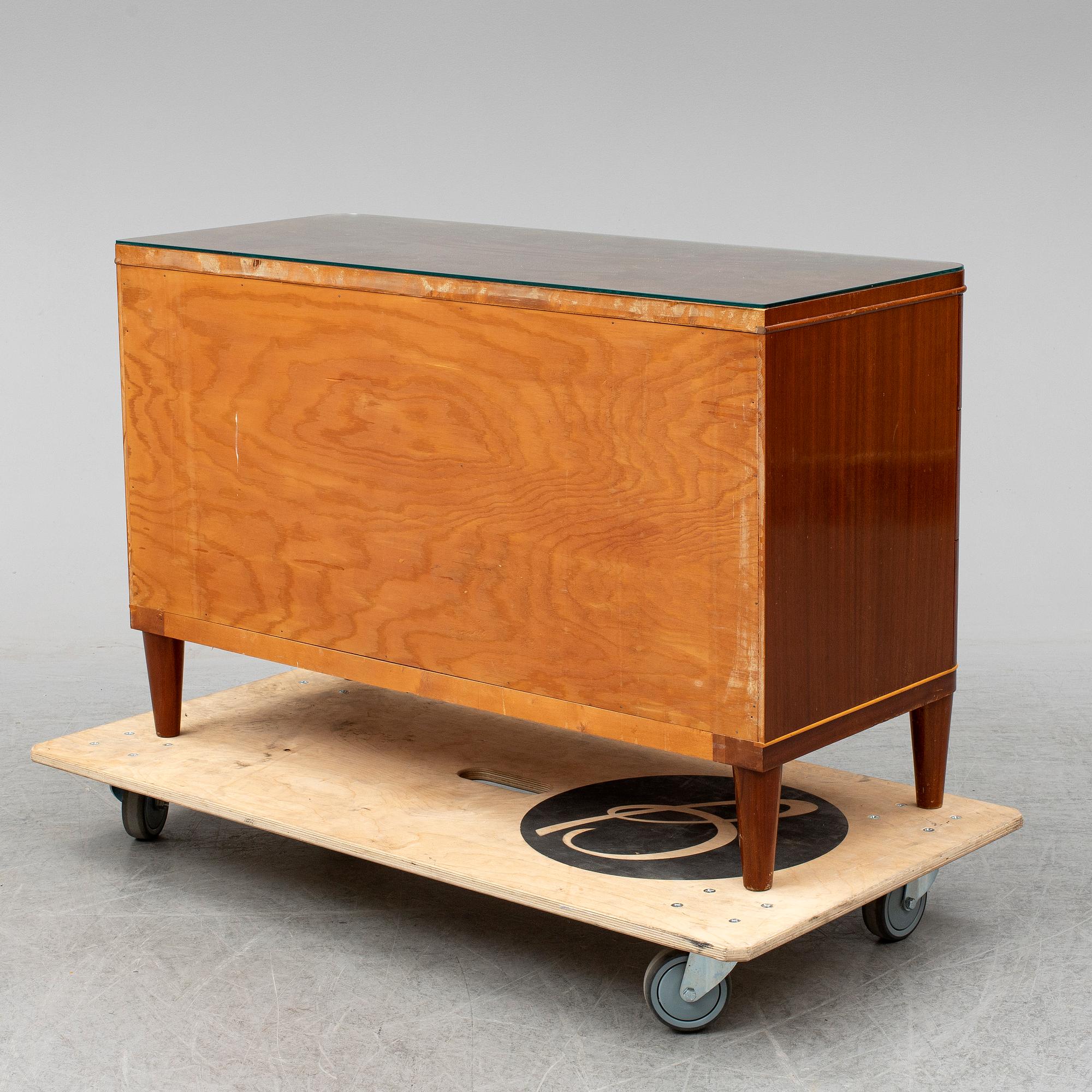 A chest of drawers, mid 20th century.