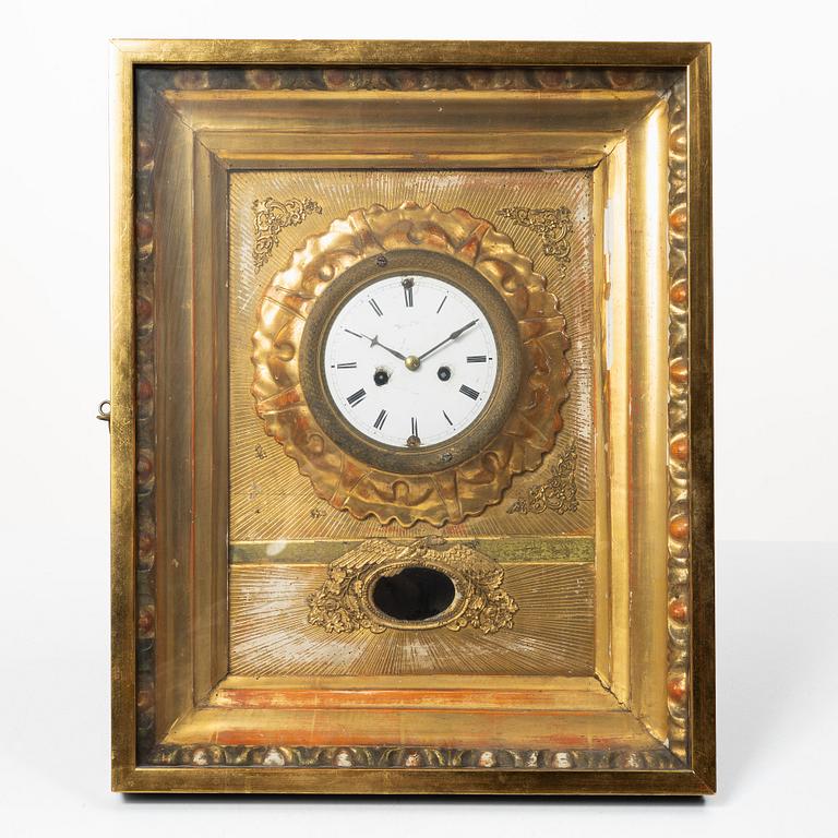 A wall clock. Germany, 19th Century.