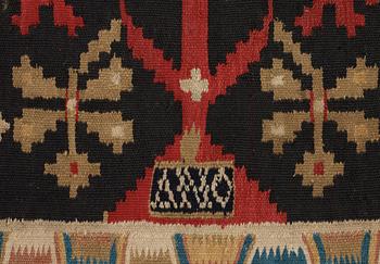 CARRIAGE CUSHION. Rölakan (flat weave). 51,5 x 114 cm. Skåne, Skytts härad (district), dated 1819.