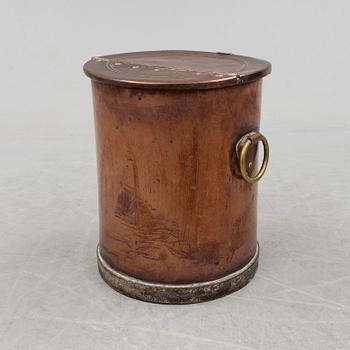 A copper water container, around the year 1900.