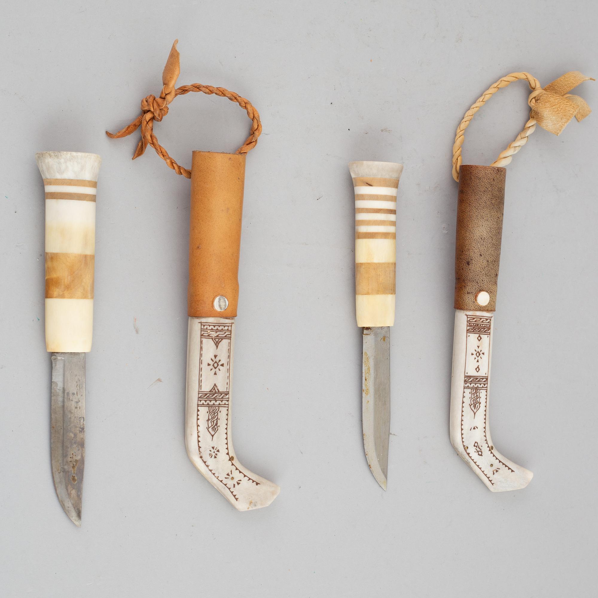 Per Henrik Simmas, two Sami reindeer horn knives, signed.
