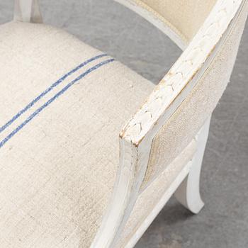 A pair of Gustavian style armchairs from around year 1900.