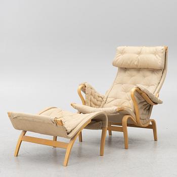 Bruno Mathsson, A "Pernilla" armchair with footstool, Dux, Sweden, second half of the 20th century.