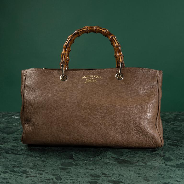 A bag "Bamboo shopper" by GUCCI.