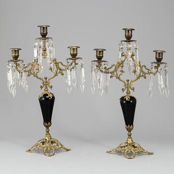 A pair of Victorian brass candelabra from around year 1900.