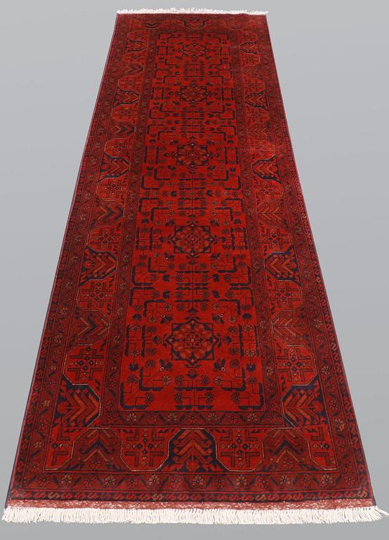 An Afghan runner, so called Khan Mohammadi, ca 297 x 78 cm.